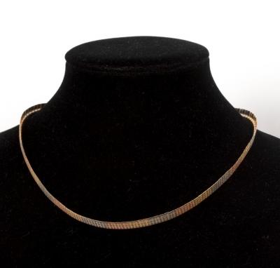 Appraisal: An ct tri-colour gold necklace of flattened textured links approximately