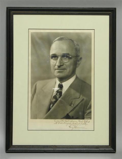 Appraisal: HARRY S TRUMAN SIGNED PHOTOGRAPH TO CLARK CLIFFORD Black and