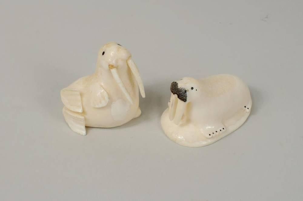 Appraisal: Two Inuit Walrus Ivory Carvings Two Inuit walrus ivory carvings