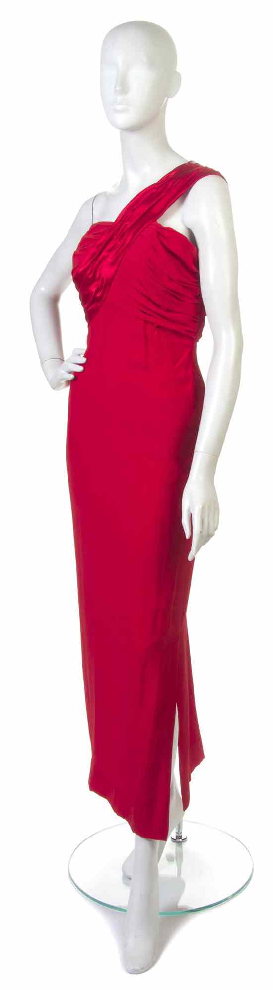 Appraisal: A Christian Dior Red Crepe Evening Gown with single shoulder