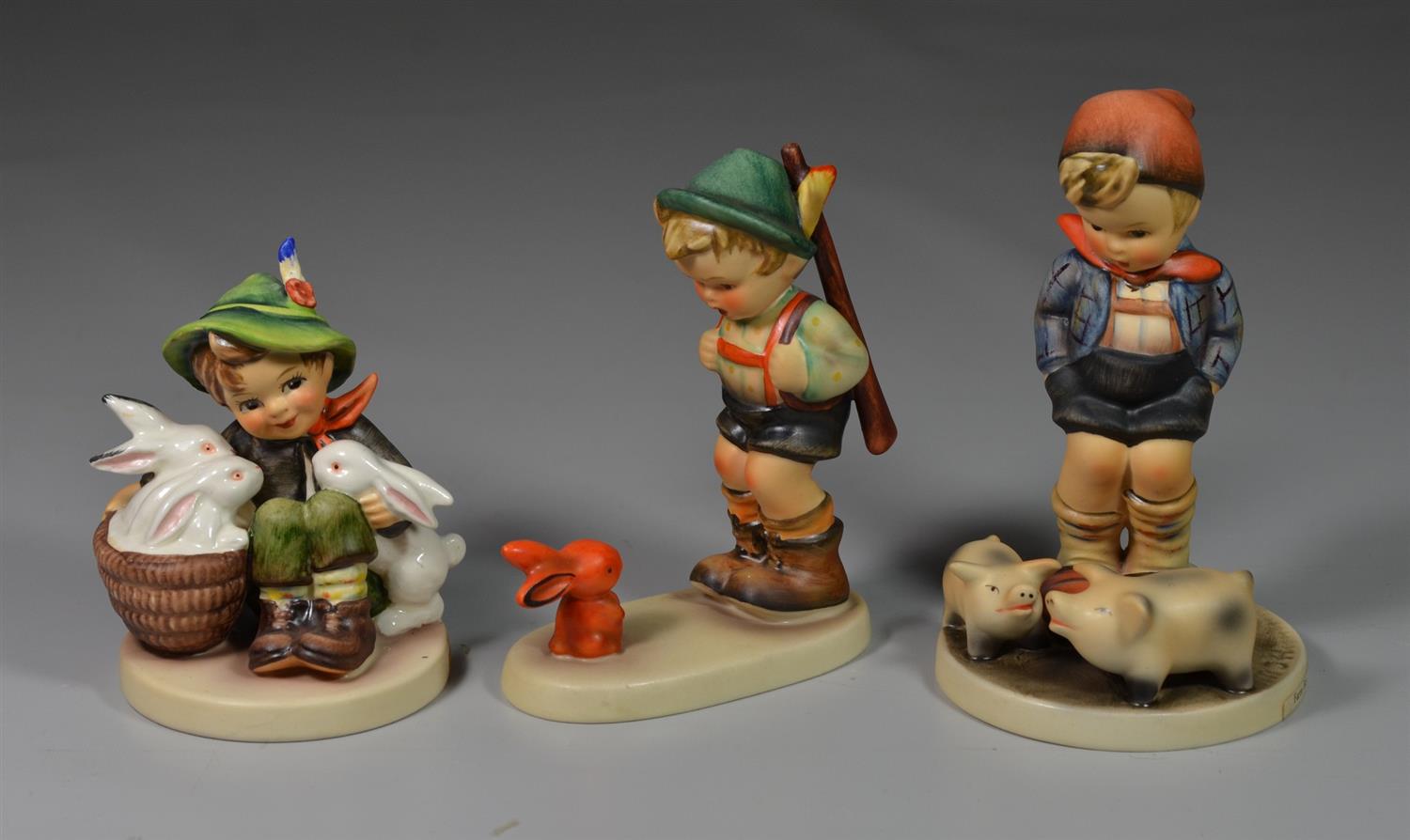 Appraisal: Goebel Hummel Figurines Playmates Sensitive Hunter Farm Boy all TMK-