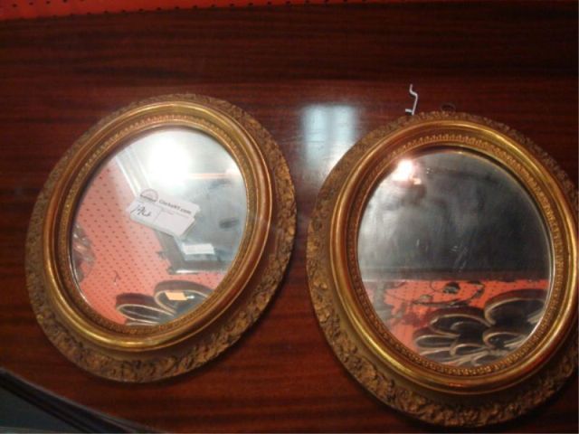 Appraisal: Pr of Oval And Gilt Mirrors From a Bronxville NY