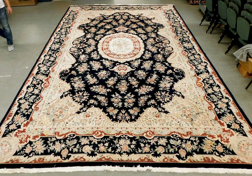 Appraisal: Semi-Antique Black White Wool Oriental Carpet Middle East th Century