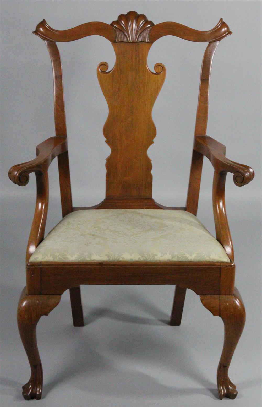 Appraisal: CHIPPENDALE STYLE CARVED MAHOGANY ARM CHAIR the arm chair with