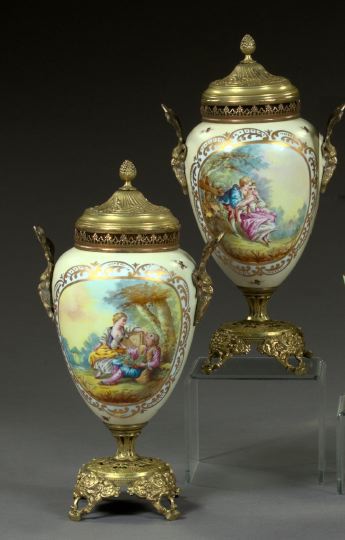 Appraisal: Pair of French Gilt-Brass-Mounted Fond Ivoire Porcelain Garniture Vases fourth