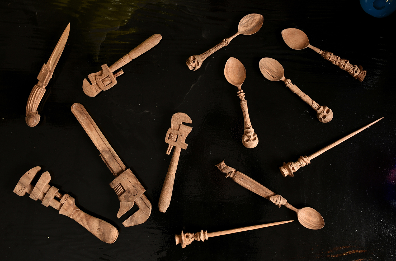 Appraisal: A COLLECTION OF DAVID BROMLEY HAND CARVED WRENCHES SPOONS AND