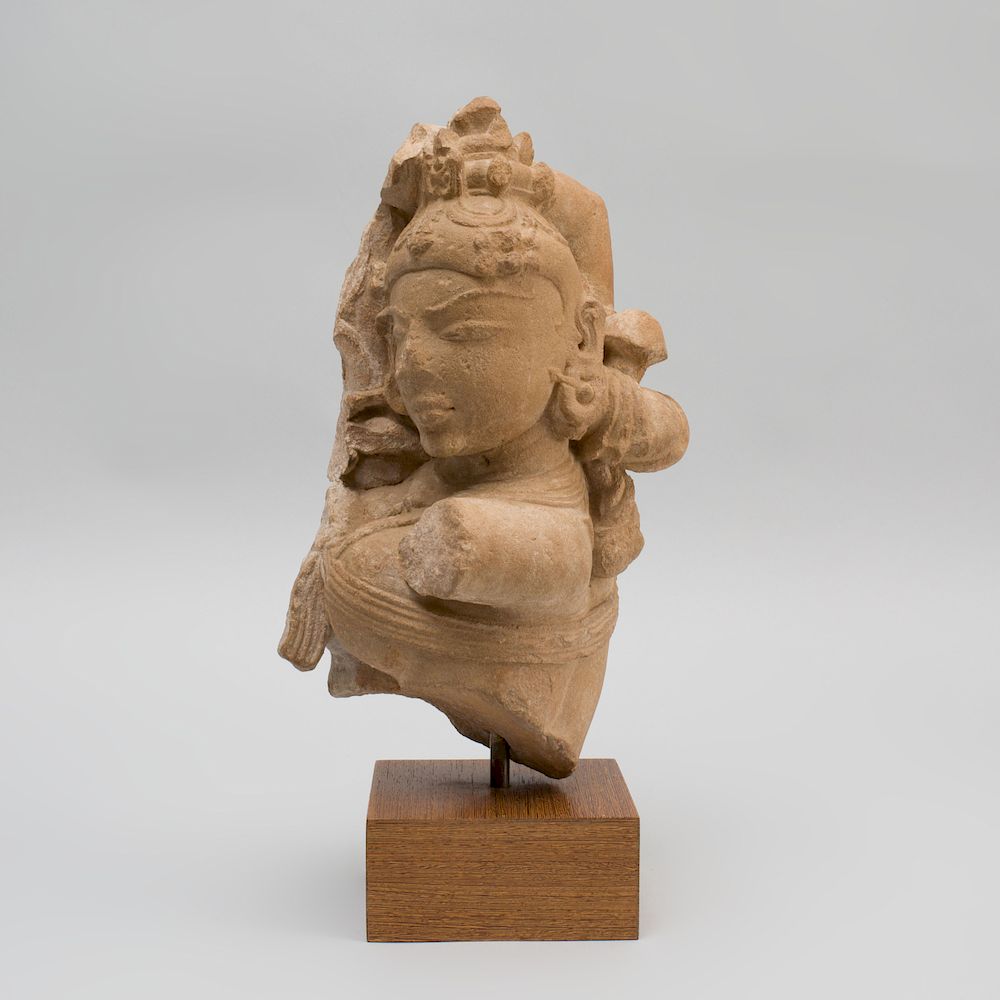 Appraisal: Indian Carved Sandstone Fragmentary Bust of a Goddess Now raised