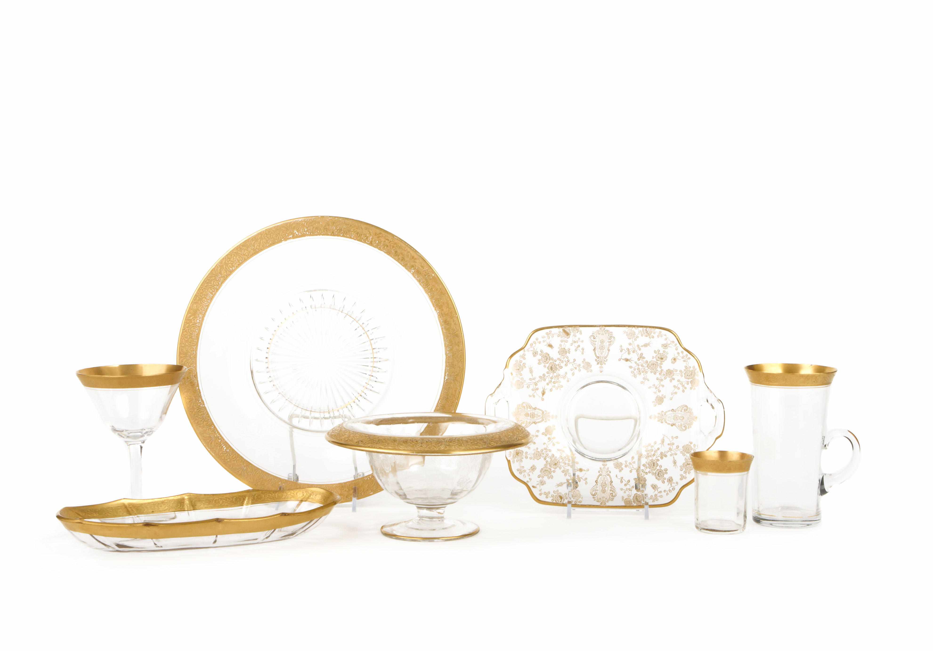 Appraisal: An assorted group of gilt glass stemware plates serving pieces