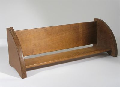 Appraisal: A Colin Almack Beaverman oak book trough carved to the