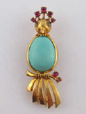 Appraisal: Chaumet A French hallmarked carat gold turquoise and ruby bird