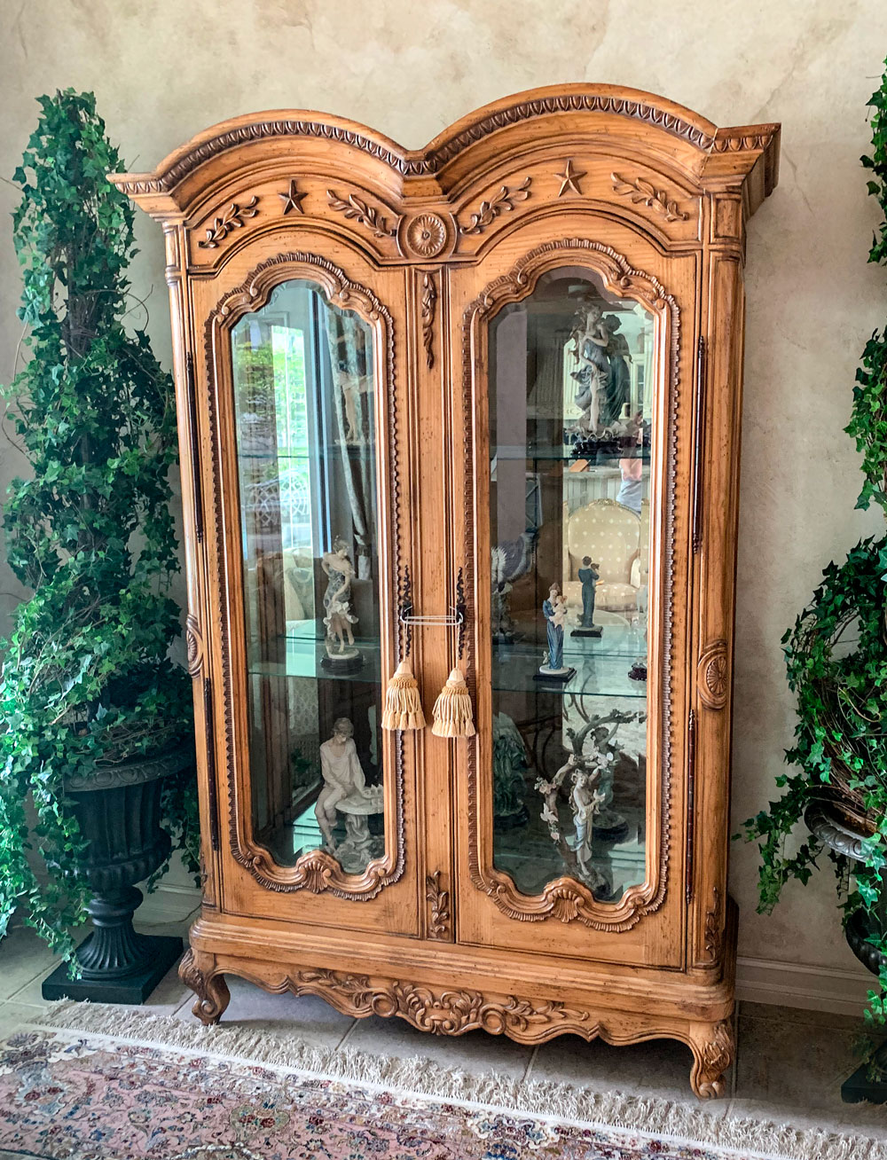 Appraisal: DOUBLE DOOR CARVED CURIO CABINET beveled glass doors glass shelf