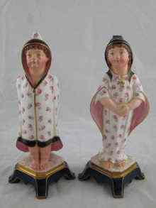 Appraisal: Royal Worcester A boy and girl in night attire model