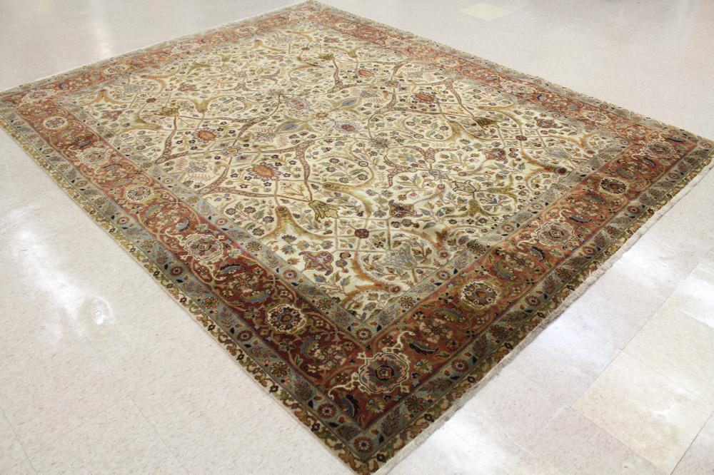 Appraisal: HAND KNOTTED ORIENTAL CARPET Indo-Persian overall floral design on dark