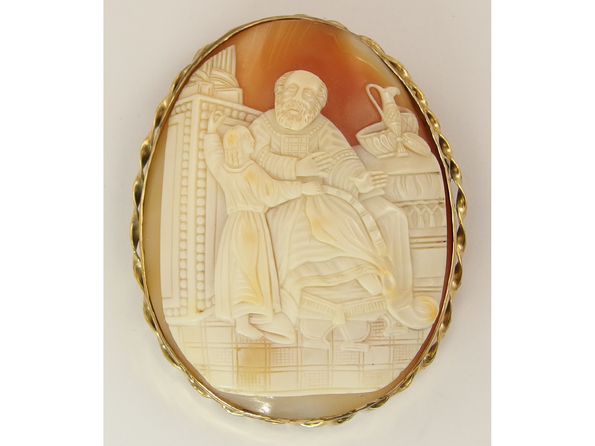 Appraisal: A large shell cameo carved with a philosopherpossibly Socrates in