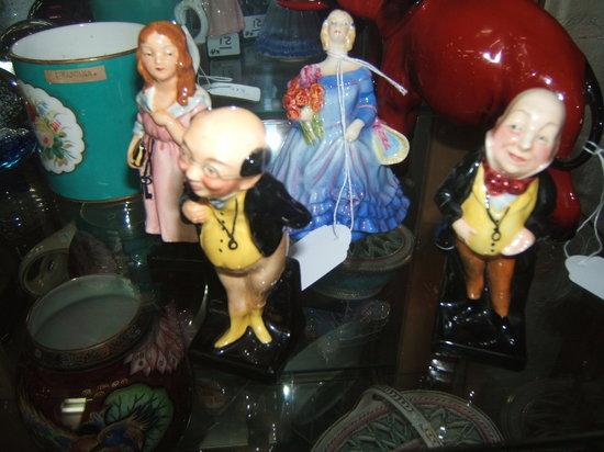 Appraisal: A Royal Doulton figure 'Little Nell' another 'Pickwick' another 'Micawber'