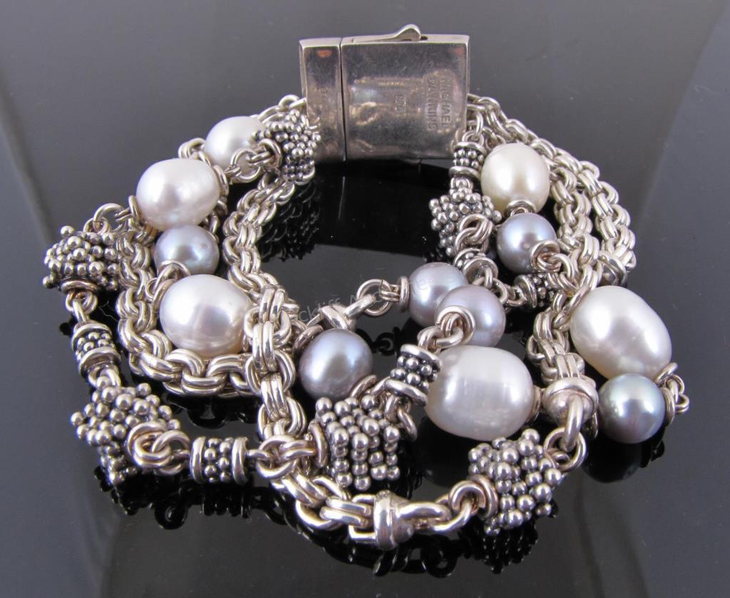 Appraisal: A Michael Dawkins sterling silver four-strand pearl bracelet long