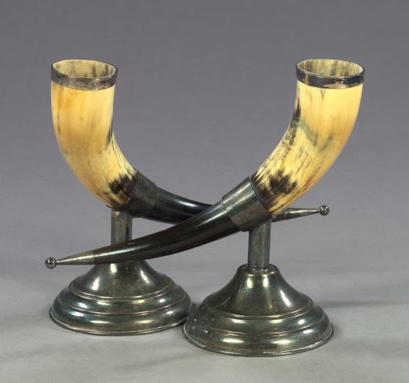 Appraisal: Large Pair of German Silverplate-Mounted Blonde and Black Drinking Horns