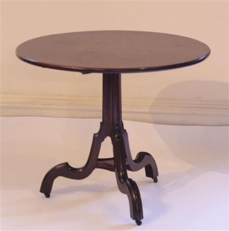 Appraisal: A George III mahogany circular occasional table the tilt-top on