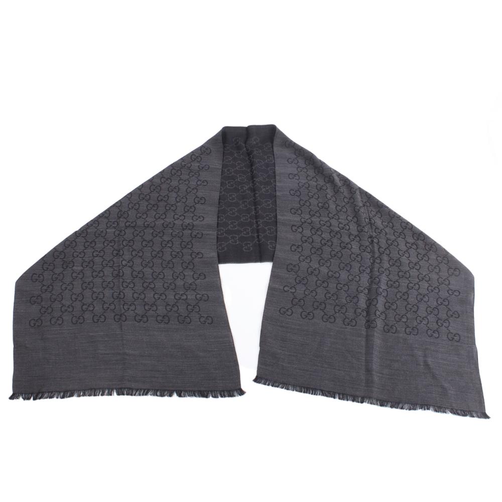 Appraisal: Gucci gray wool GG jacquard pattern knitted scarf with fringe