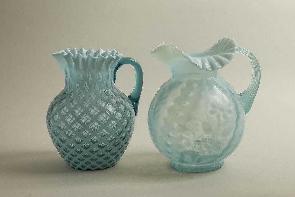 Appraisal: Two Blue Glass Pitchers Two blue art glass pitchers Dimensions