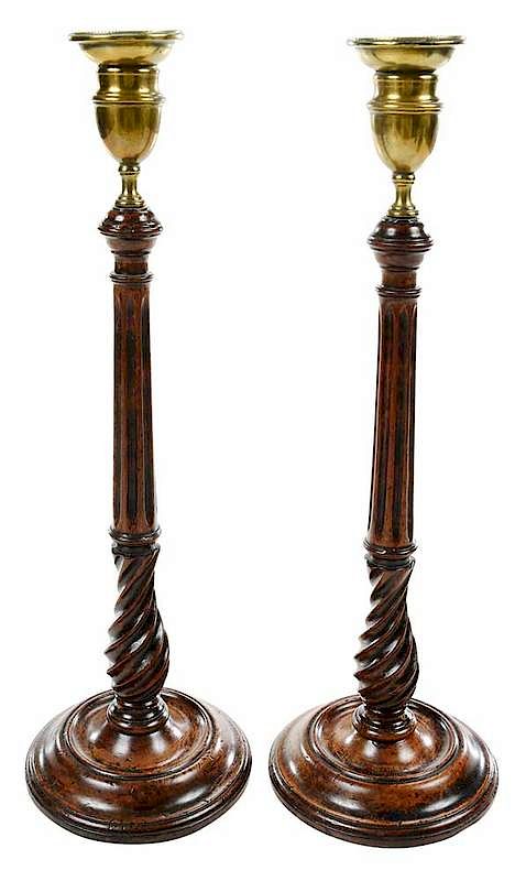 Appraisal: Pair Georgian Mahogany and Brass Candlesticks British th century swirl