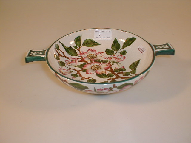 Appraisal: A Wemyss quaich hand painted with apple blossom impressed to