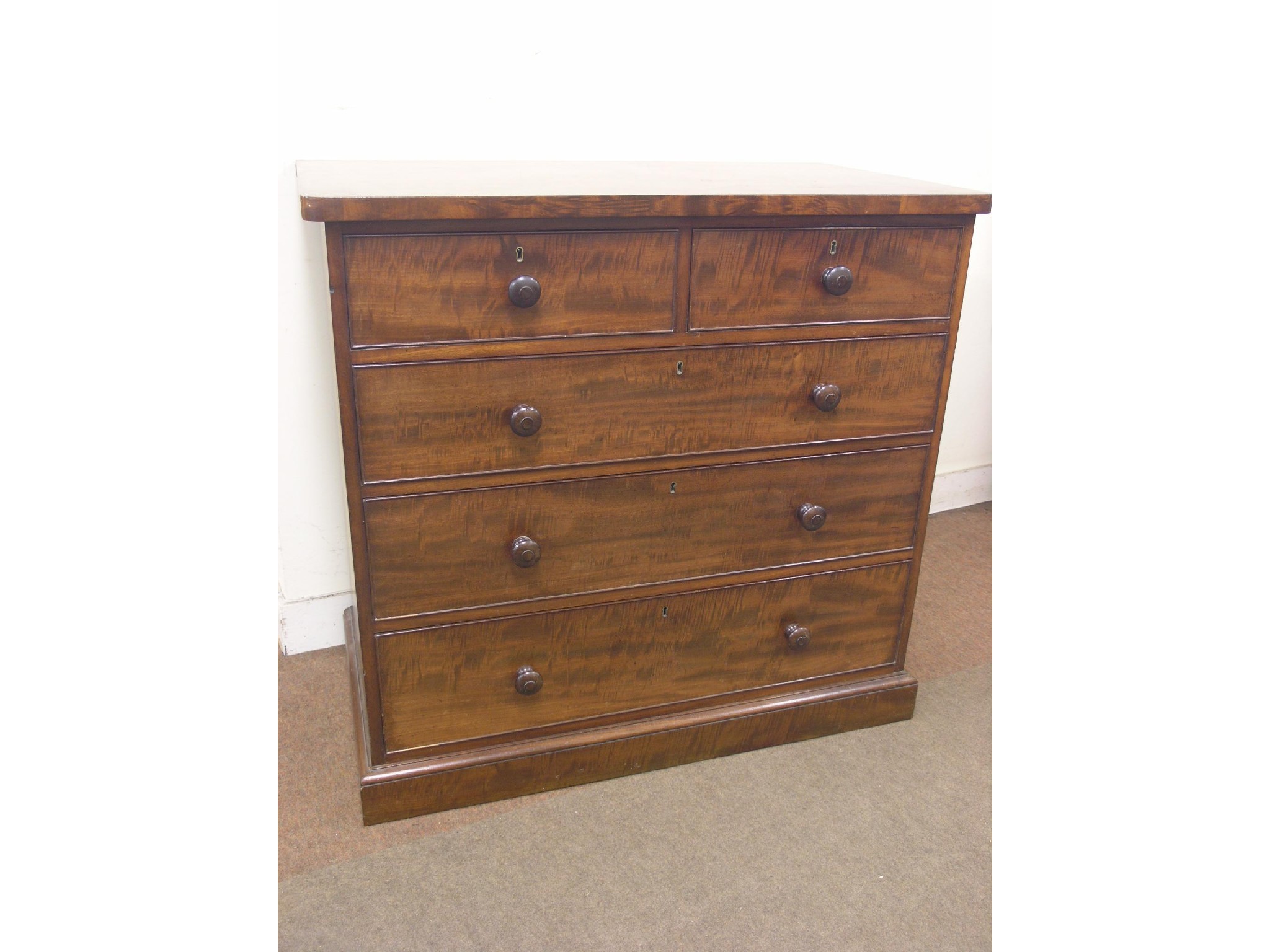 Appraisal: A Victorian mahogany chest two short and three long mahogany-lined