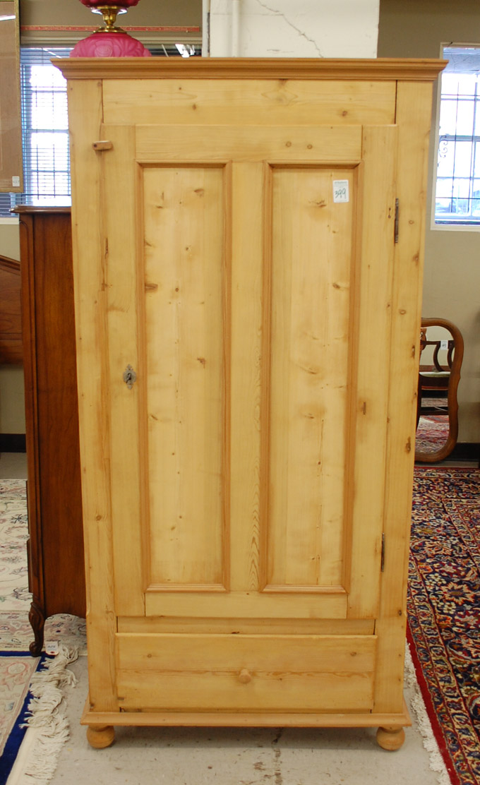 Appraisal: SINGLE-DOOR PINE WARDROBE Continental th century the locking panel door