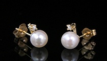 Appraisal: A Lovely Pair of Pearl Diamond Ear Studs k yellow