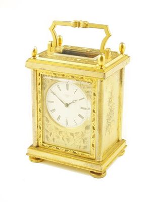 Appraisal: A mid th century English gilt brass carriage clock with