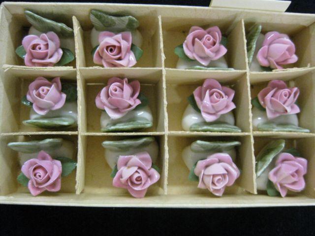 Appraisal: Set of Dresden Porcelain Place Card Holders figural rose decor