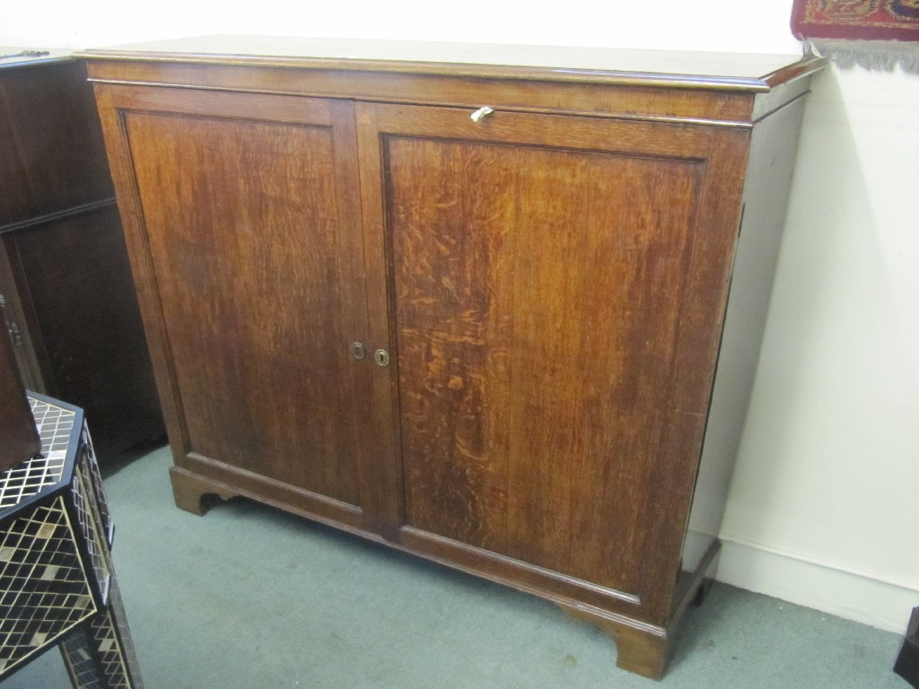 Appraisal: th century oak two door bookcase