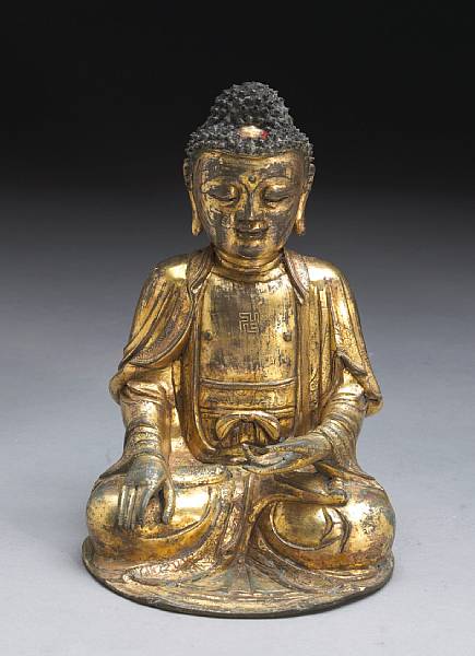 Appraisal: A gilt bronze figure of Buddha Ming Dynasty Seated dhyanasana