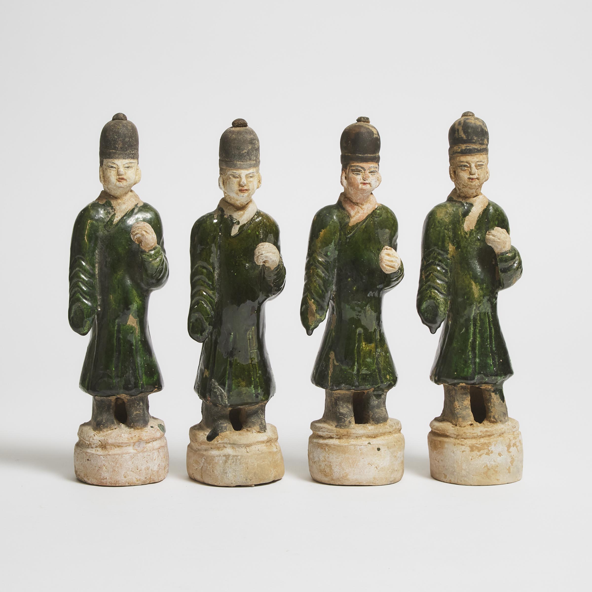 Appraisal: A Group of Four Green-Glazed Pottery Figures Ming Dynasty -