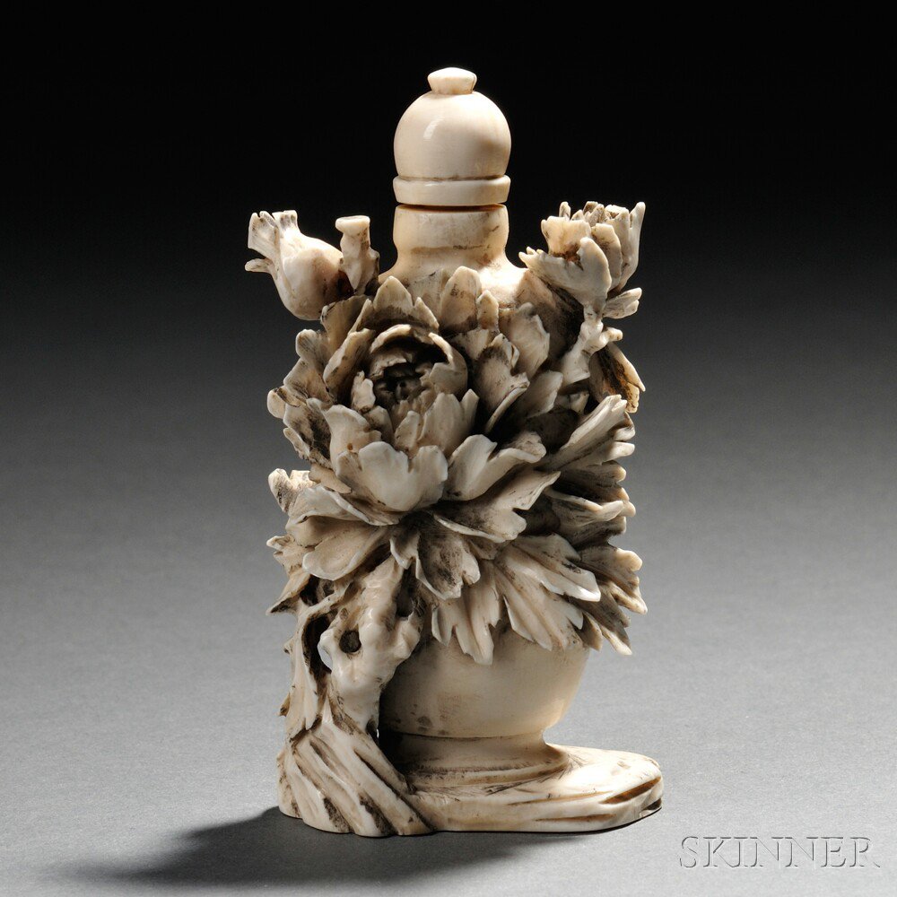 Appraisal: Ivory Snuff Bottle China th th century elongated oviform resting