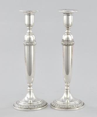 Appraisal: A Pair of Weighted Sterling Silver Candlesticks With a floral