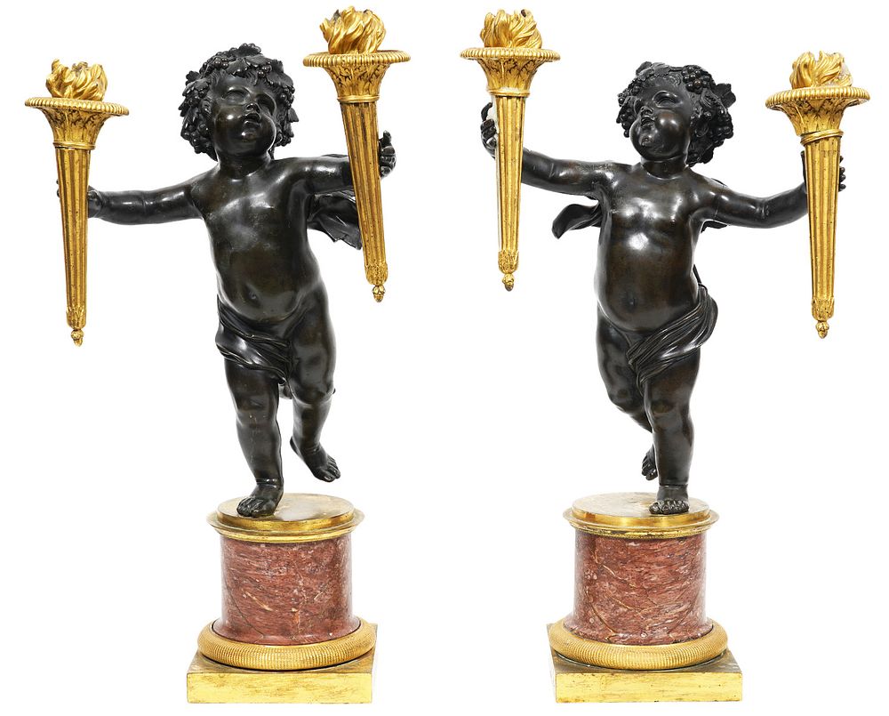 Appraisal: th Ct Pr Winged Putti Candelabras in Marble Bronze Pair