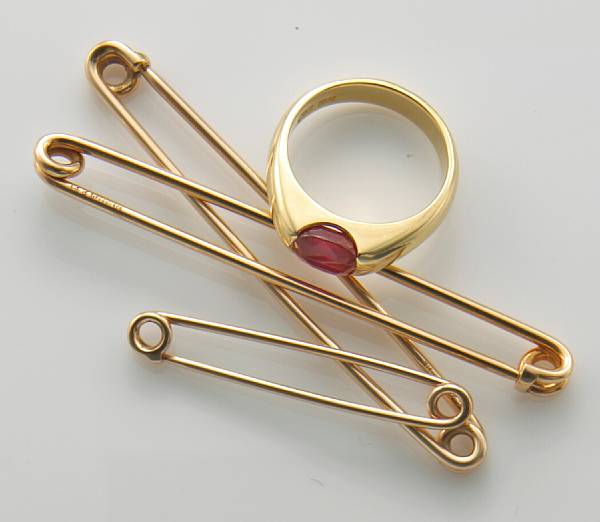 Appraisal: A ruby and k gold ring together with three k