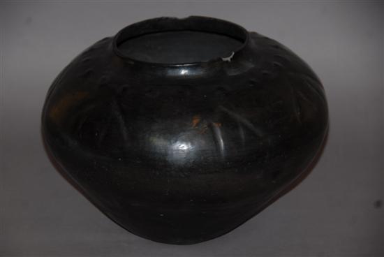 Appraisal: ANTIQUE NATIVE AMERICAN VESSEL Black glazed pottery D x H