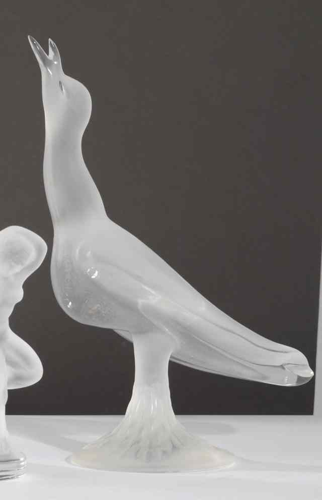 Appraisal: LALIQUE FRANCE GLASS BIRD SCULPTURE with head up and beak