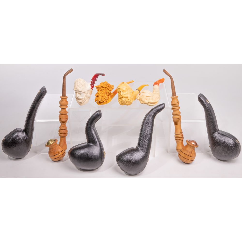 Appraisal: MEERSCHAUM AND WOOD SMOKING PIPE ASSORTMENT pipes carved from sepiolite