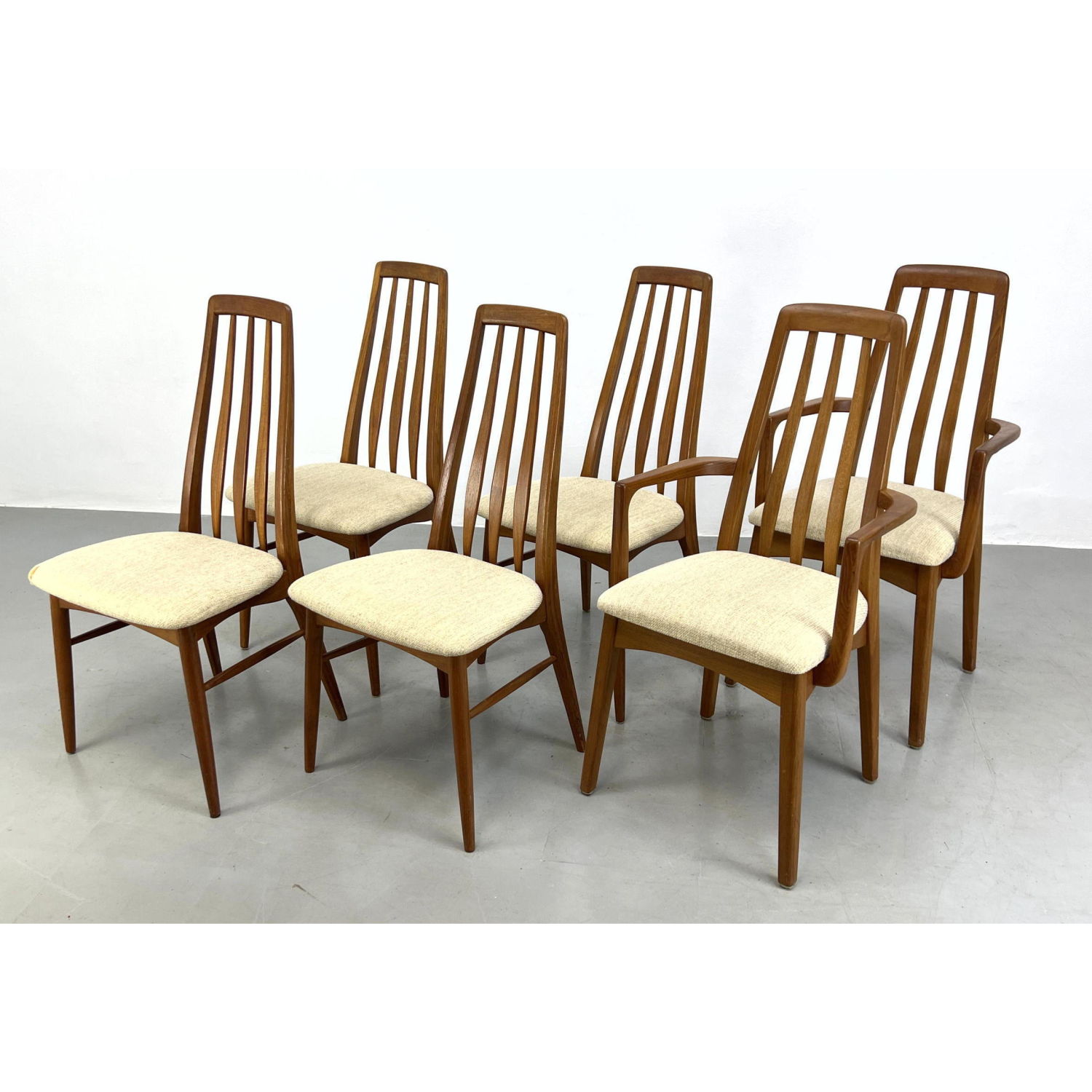 Appraisal: Set KOEFOEDS HORNSLET teak dining chairs Tall Slat Backs Stamp