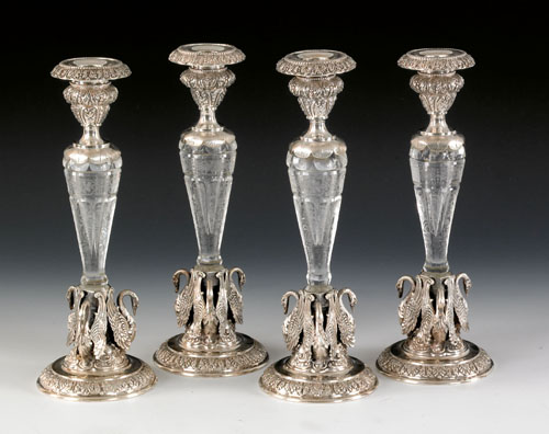 Appraisal: Set of four German silver and etched glass candlesticks late