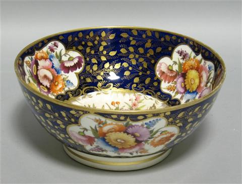 Appraisal: STAFFORDSHIRE BLUE GROUND PUNCH BOWL Circa painted in colors with