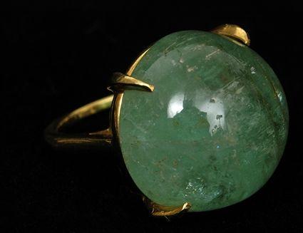 Appraisal: BERYL CABOCHON SET IN K GOLD RING Size Provenance Property