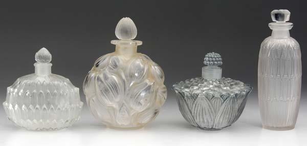 Appraisal: RENE LALIQUE Four perfume bottles of clear and frosted glass