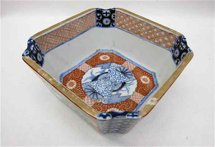 Appraisal: HACHIROYE JAPANESE KUTANI PORCELAIN SQUARE BOWL having red framed hand