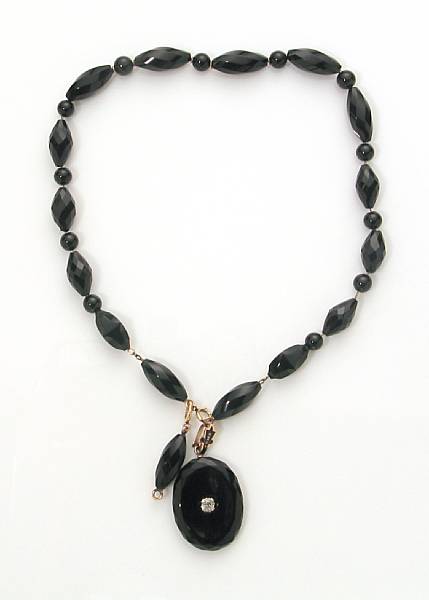 Appraisal: An antique black onyx diamond enamel and k gold necklace