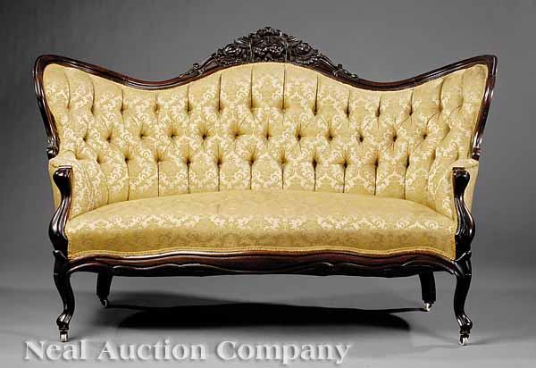 Appraisal: A Pair of American Rococo Carved Rosewood Settees mid- th