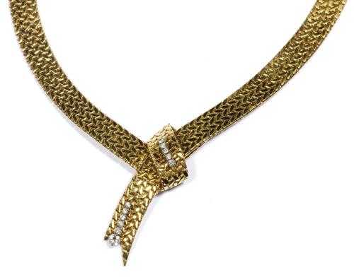 Appraisal: GOLD AND DIAMOND NECKLACE Yellow gold g Casual-elegant necklace in